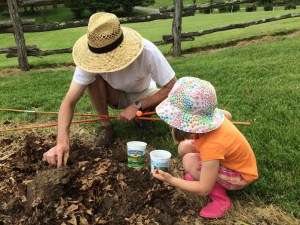 Ben and Helen digging worms. Clara was not interested in this activity.